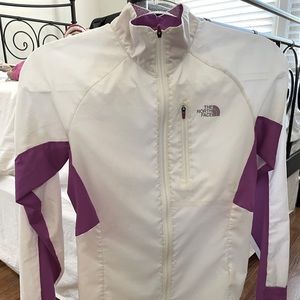 Cute North Face zip up jacket/windbreaker. Very lightweight. Great condition.